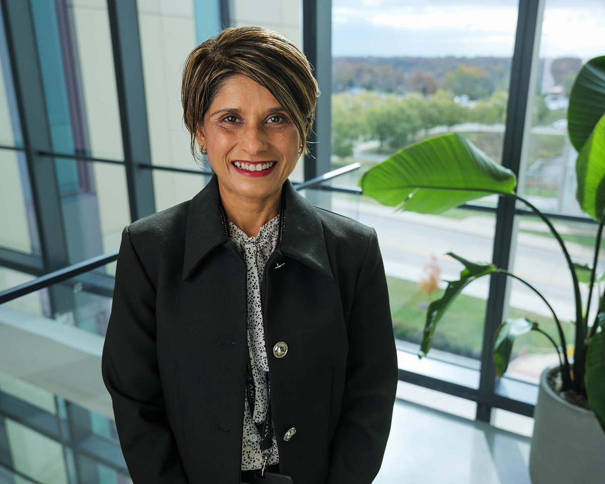 Smita Saxena stands in the Roy Blunt NextGen Precision Health building.