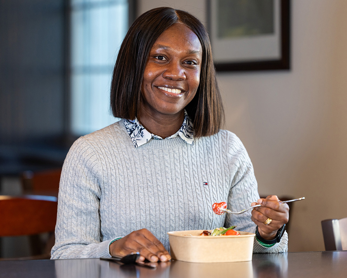 Katherene Osei-Boadi Anguah eats a fiber-rich meal from the University of Missouri's Savor Kitchen, reinforcing the importance of diet on gut health.