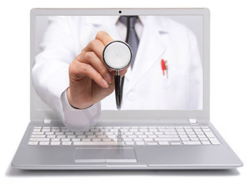 Laptop showing doctor holding stethoscope